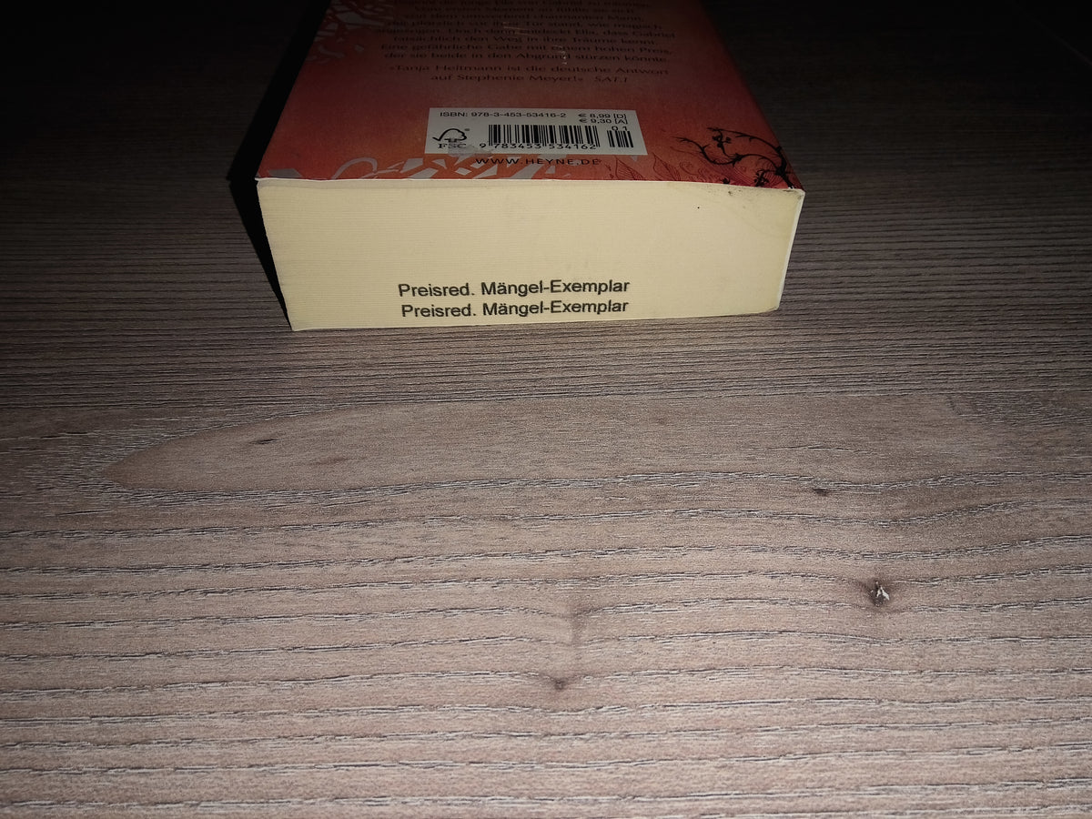 Detailansicht des unteren Buchschnitts mit dem Stempel „Preisred. Mängelexemplar“