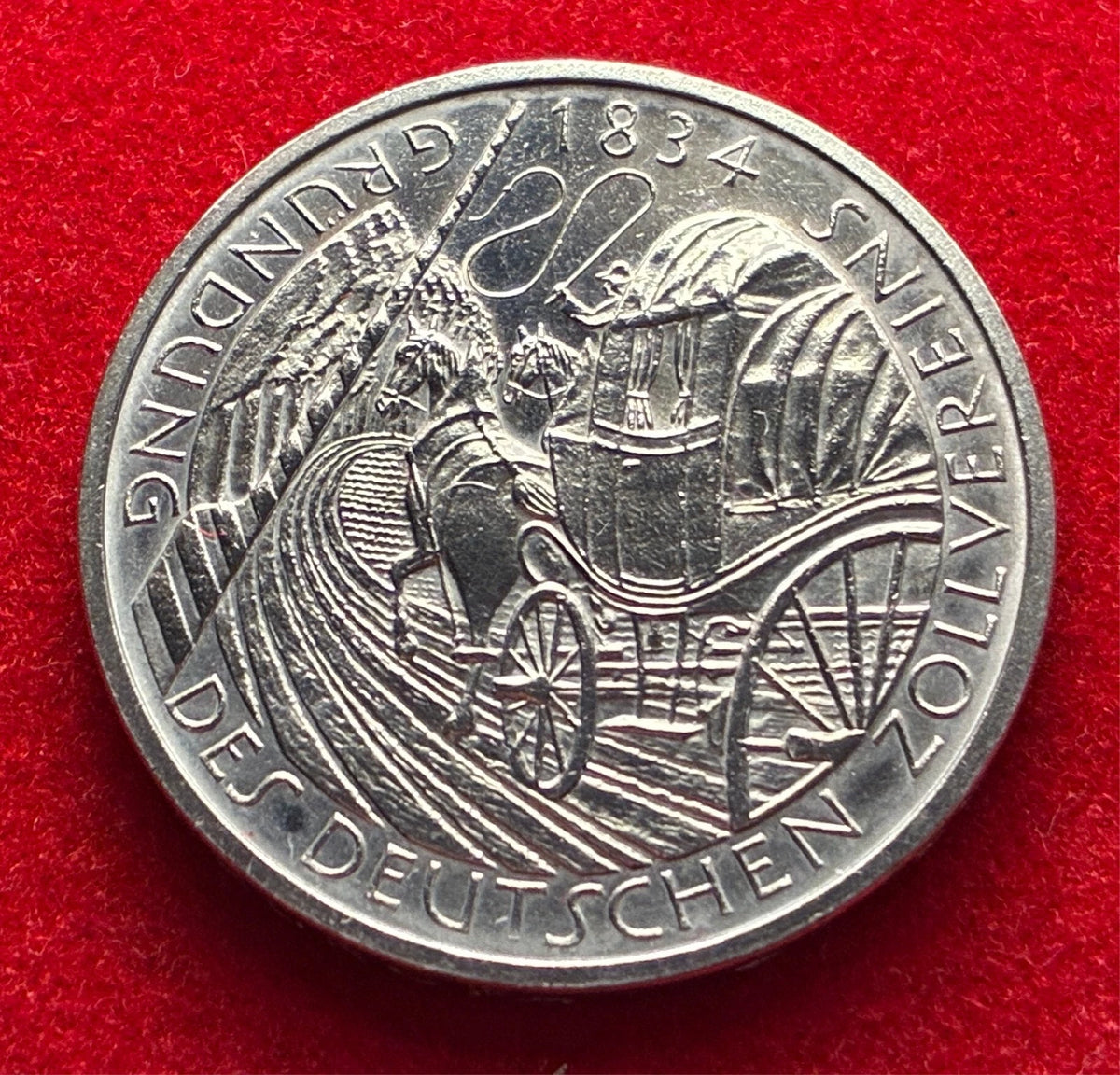 5 Deutsche Mark 1984 D | Bundesrepublik Deutschland (BRD) | 150 Jahre Deutscher Zollverein | Postkutsche | Kupfer-Nickel Gedenkmünze | schön