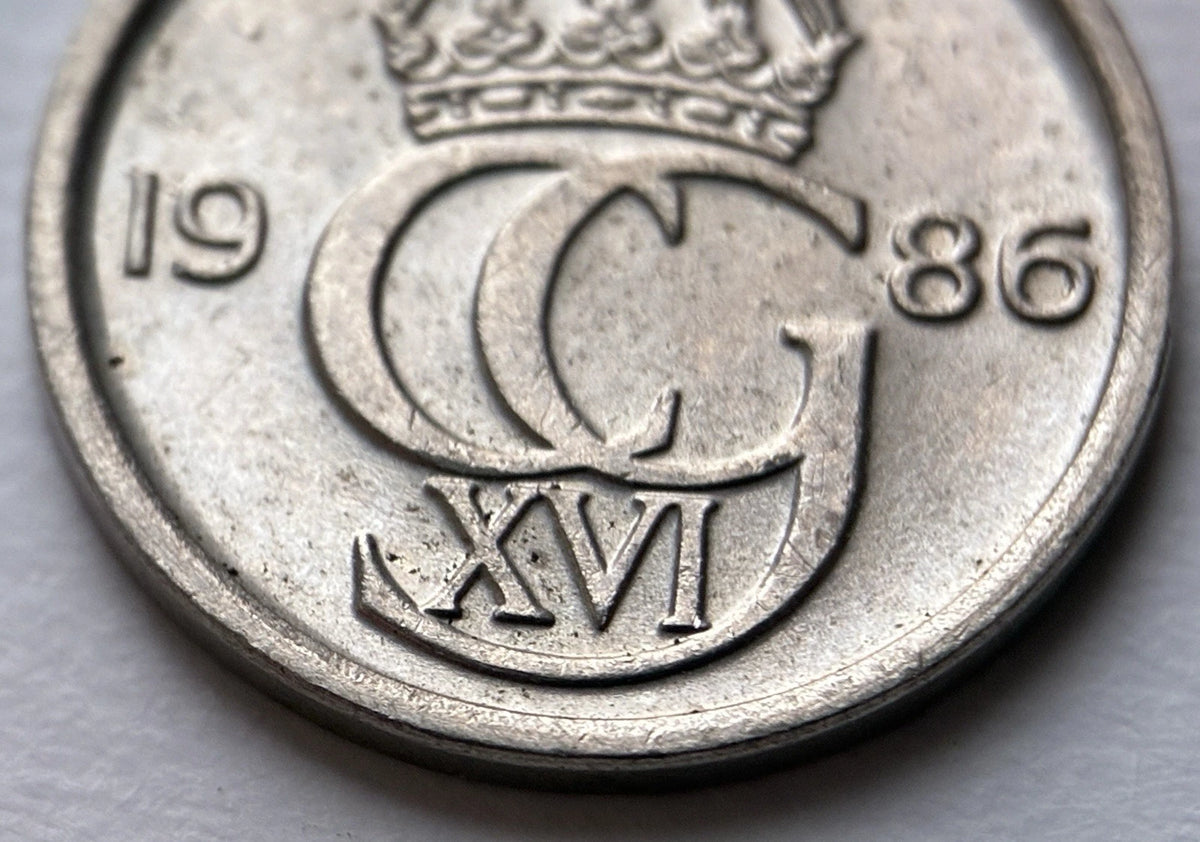 10 Öre 1986 | Schweden | Carl XVI. Gustaf Monogramm | Kupfer-Nickel Münze | schön