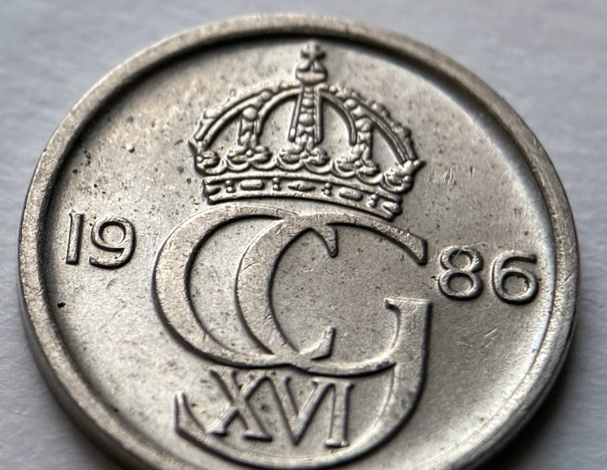 10 Öre 1986 | Schweden | Carl XVI. Gustaf Monogramm | Kupfer-Nickel Münze | schön
